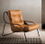 Sarlande Кресло из ткани и металла в современном стиле