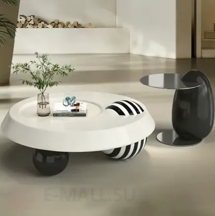 Интерьерный журнальный столик на фигурном основании Carlet